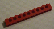 Lego 10 peg red technic beam, 10 studs, 9 axle hole