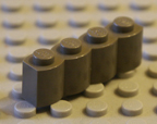 Dark old grey Lego brick.
