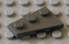 Dark old grey Lego plate.